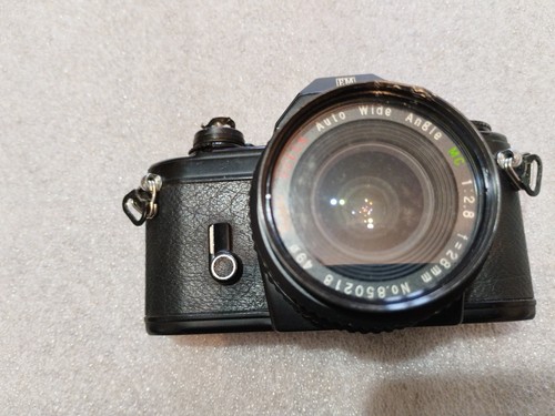 Nikon con obiettivo super - em,